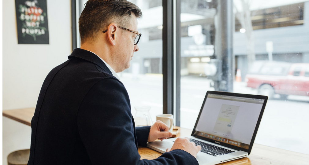 a man on a laptop