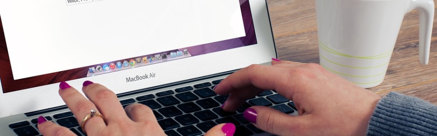 typing on laptop